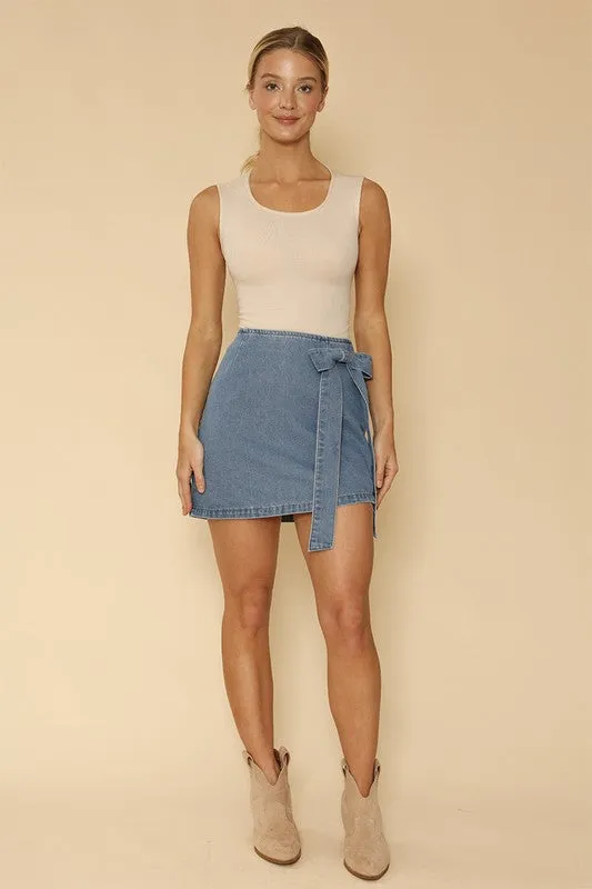 Asymmetrical denim bow skirt
